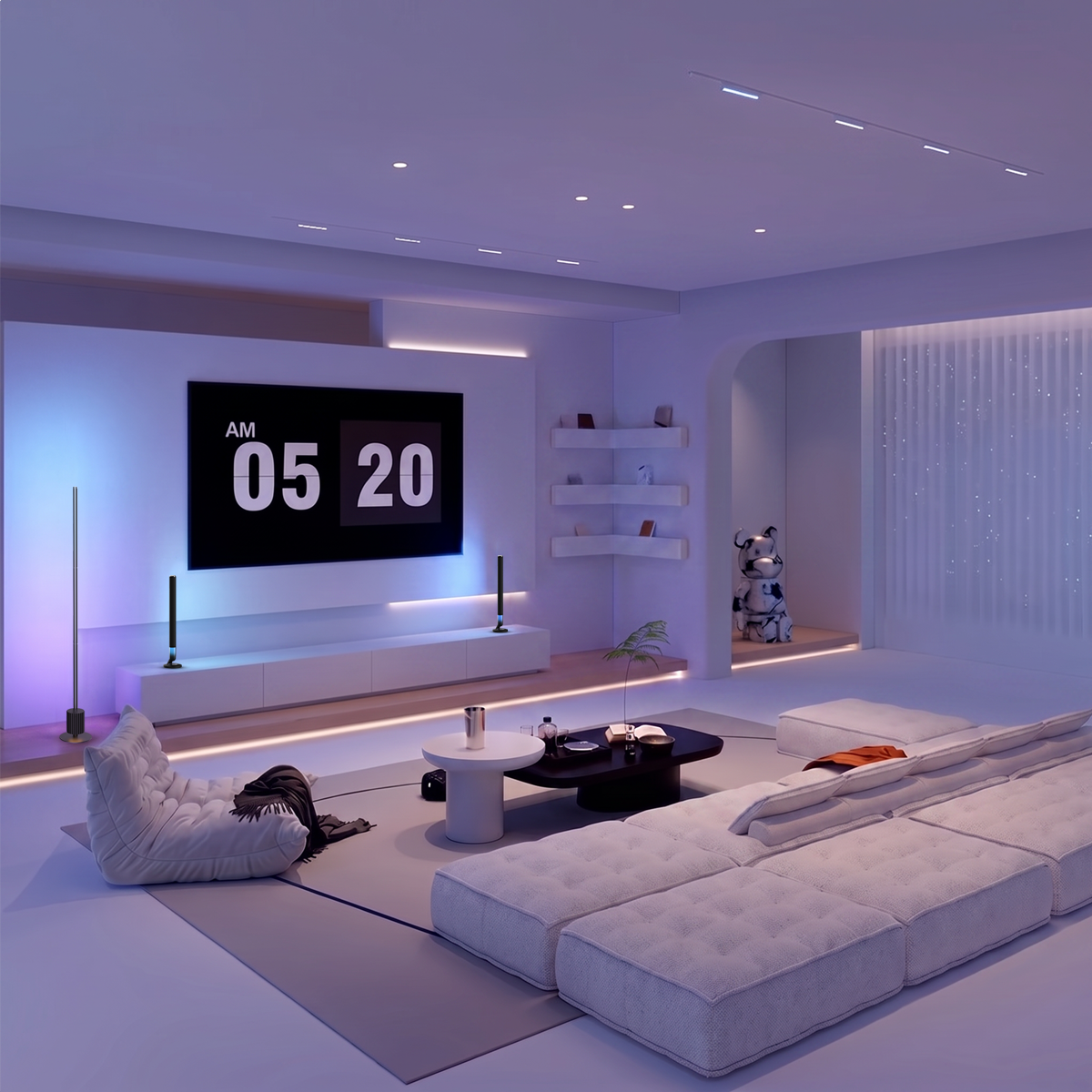 A modern minimalist living room with a large wall-mounted TV displaying the time 05:20. The room features a white sectional sofa, a white tufted armchair, a low black coffee table, and a white ottoman on a gray area rug.